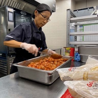 VIDEO: Cafeteria workers in Florida prepare hundreds of meals for storm shelters