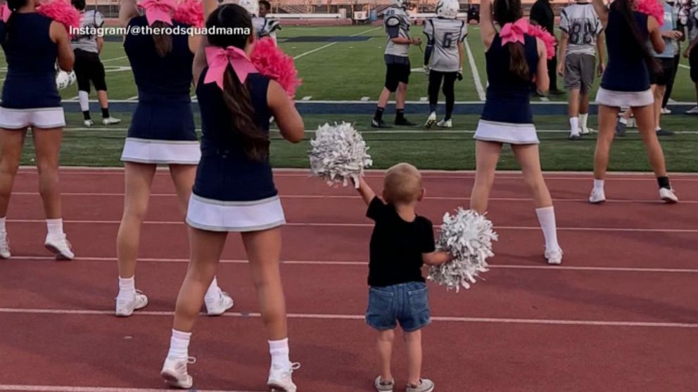 VIDEO: Toddler cheers for football team with big sister