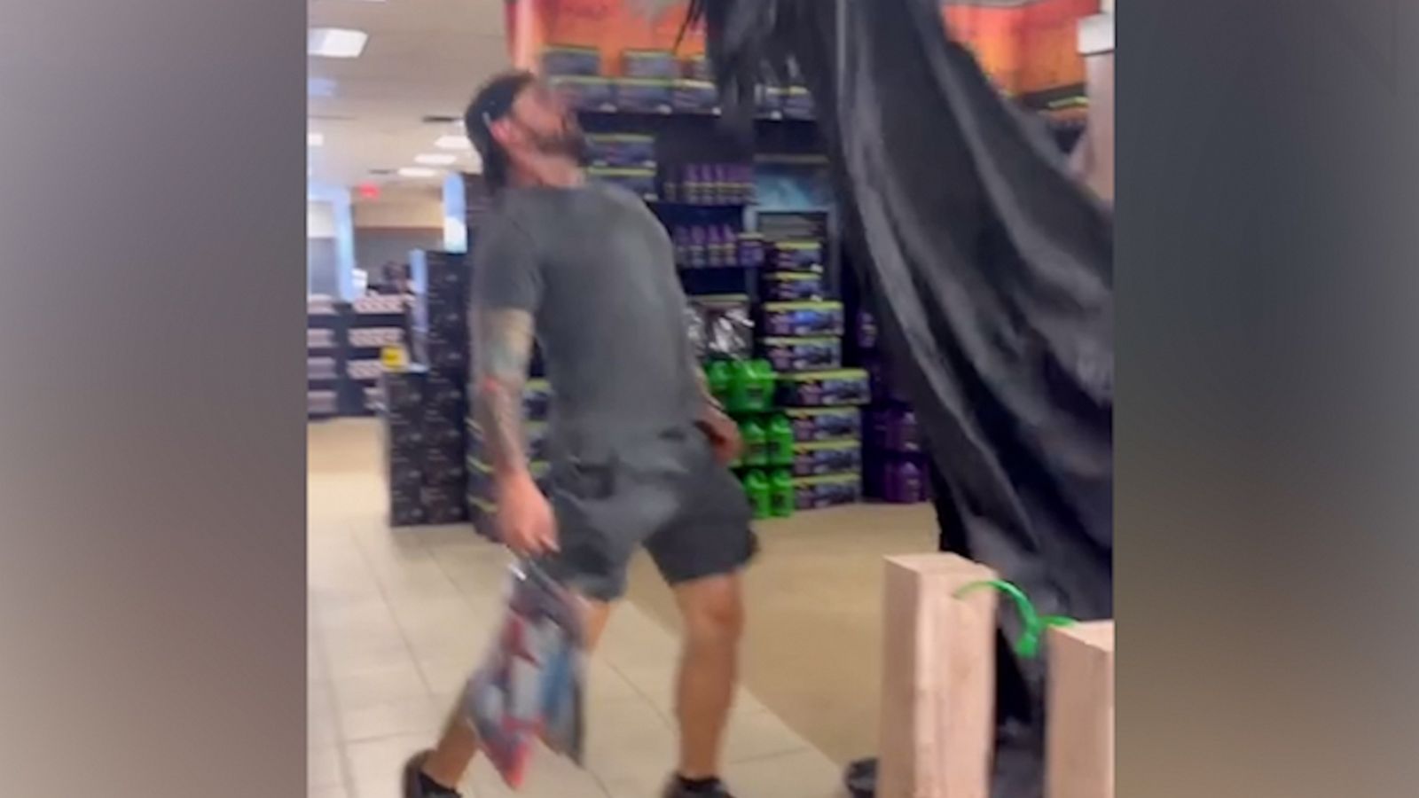 VIDEO: Country singer Brandon Davis gets frightened by hooded skeleton at Halloween store