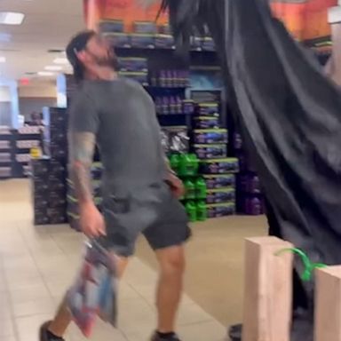 VIDEO: Country singer Brandon Davis gets frightened by hooded skeleton at Halloween store 