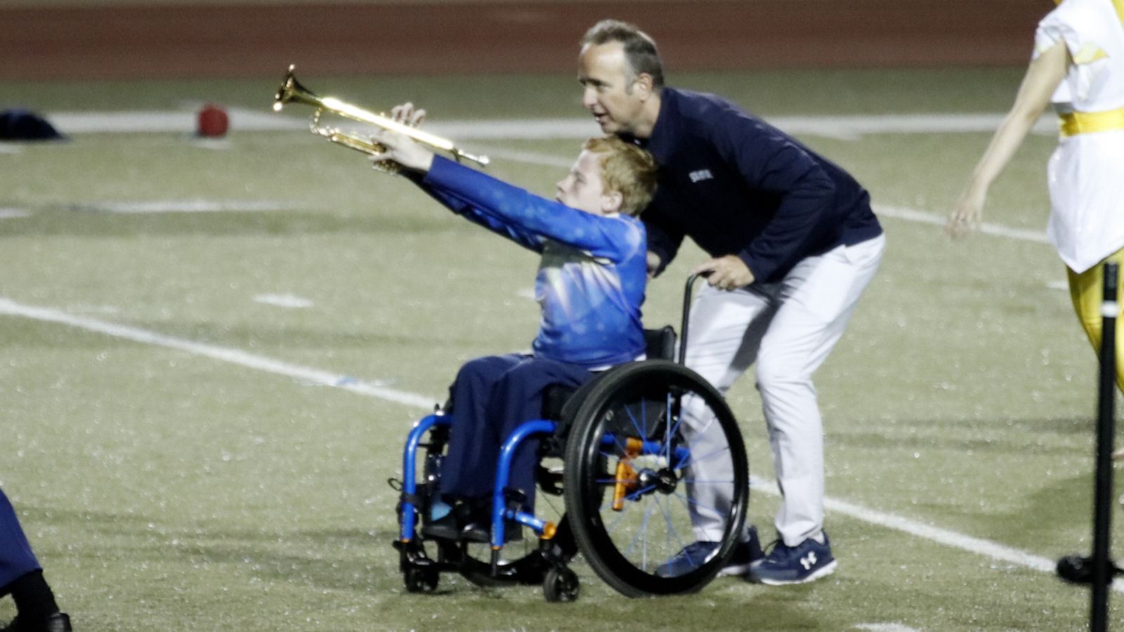 VIDEO: High school band director helps student perform with marching band