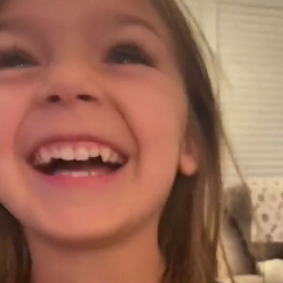 Video Little girl cries tears of gratitude unwrapping Stanley cup