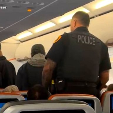 VIDEO: JetBlue passenger arrested for allegedly holding razor blade to woman's neck