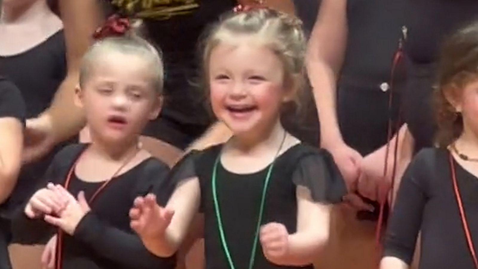 VIDEO: This girl’s face is pure joy when she finds her family in the crowd