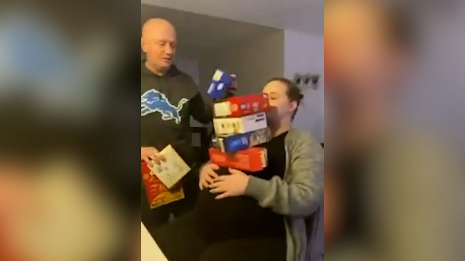 VIDEO: Man builds a snack tower on pregnant woman's belly