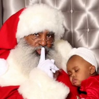 VIDEIO: These pictures of this baby sleeping on Santa will melt your heart