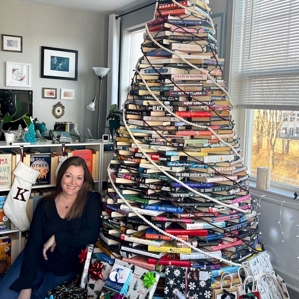 This Christmas tree is built out of books and it sleighs Good Morning
