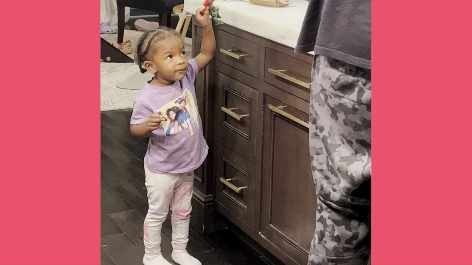 VIDEO: Adorable toddler begs her dad for a kiss under the mistletoe