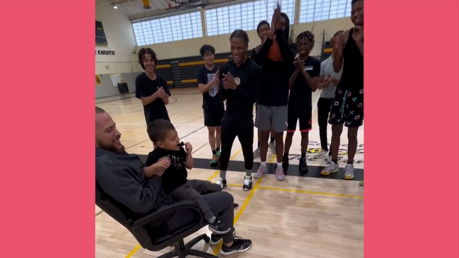 VIDEO: High school basketball team congratulates coach's son for using the potty