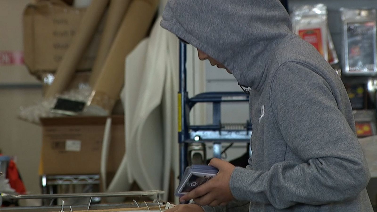 VIDEO: Boy surprised with card collection after he loses his in house fire