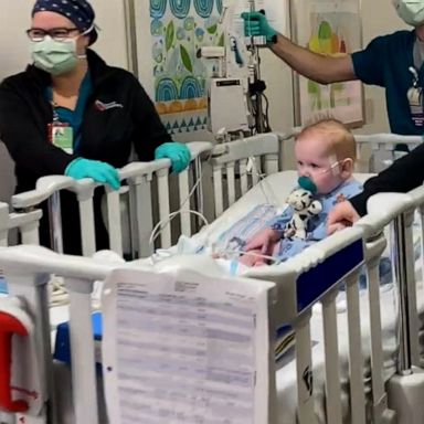 VIDEO: Toddler cheered on by hospital staff before heart transplant surgery