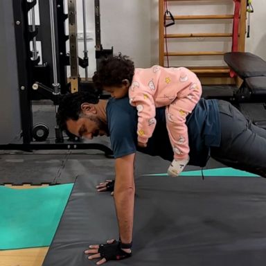 VIDEO: Watch this grandfather do pushups with granddaughter on his back