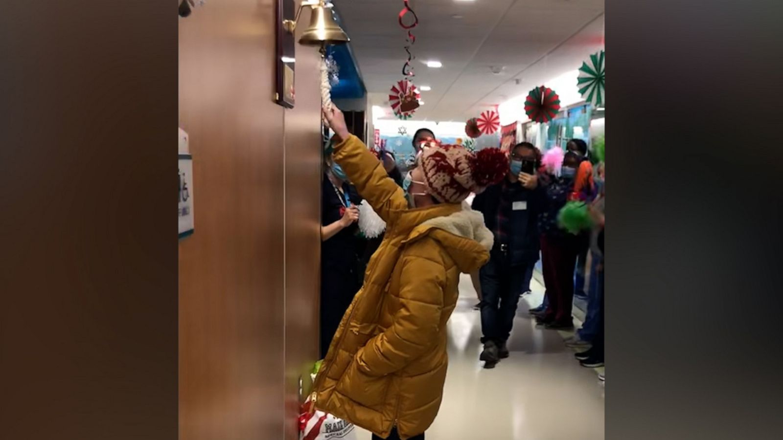 VIDEO: 12-year-old rings bell with dad after being declared cancer-free