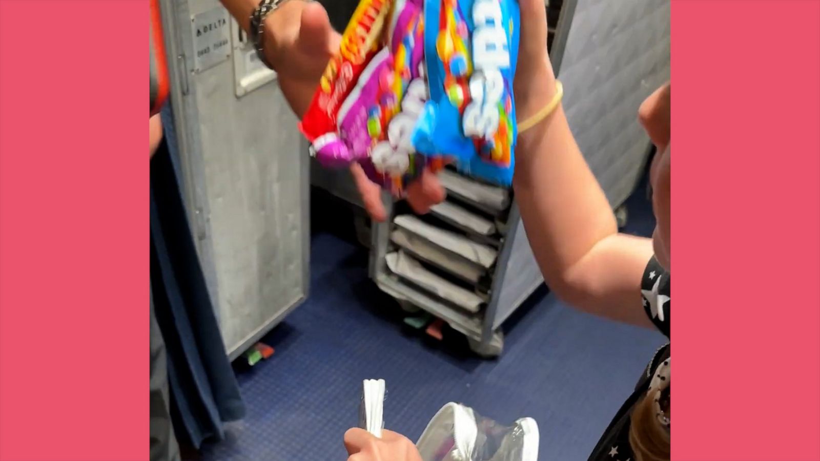 VIDEO: Little girl makes flight attendants' day by bringing them treats