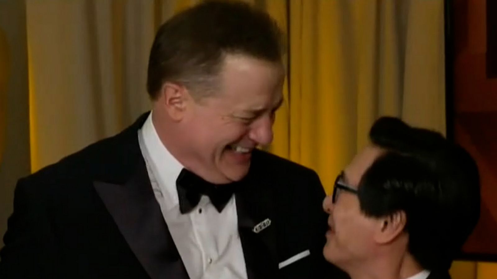 VIDEO: Ke Huy Quan surprises fellow Oscar winner Brendan Fraser backstage