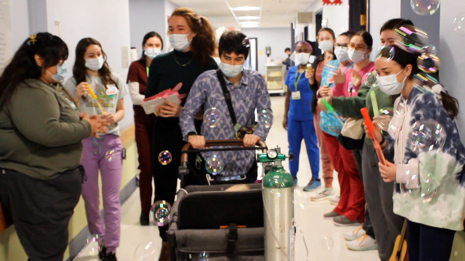 VIDEO: 15-month-old greeted with bubble parade as she leaves hospital for 1st time