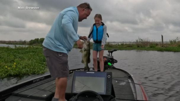 Dad and daughter time on the water catching fish of any type is