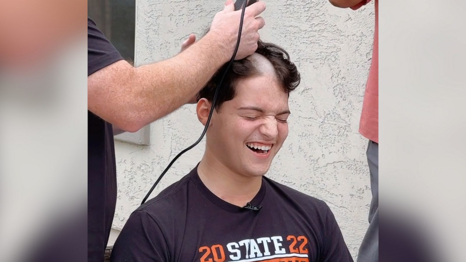 VIDEO: High school athlete with cancer throws his own 'hair shaving' party