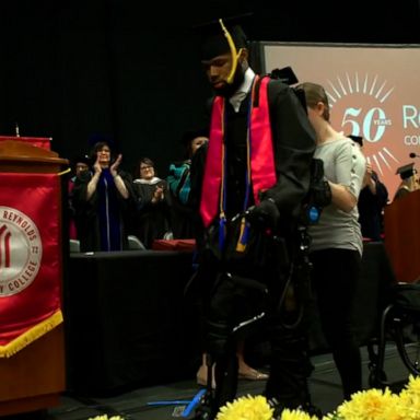 VIDEO: Watch moving moment paralyzed shooting victim walks across stage to receive diploma 