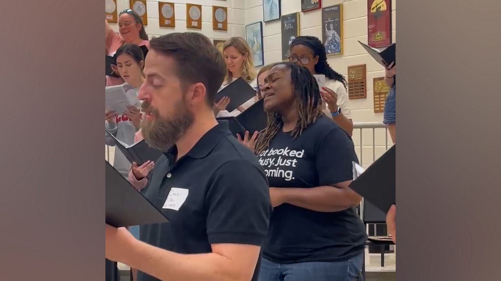 VIDEO: Former students return to high school to sing with retiring chorus teacher