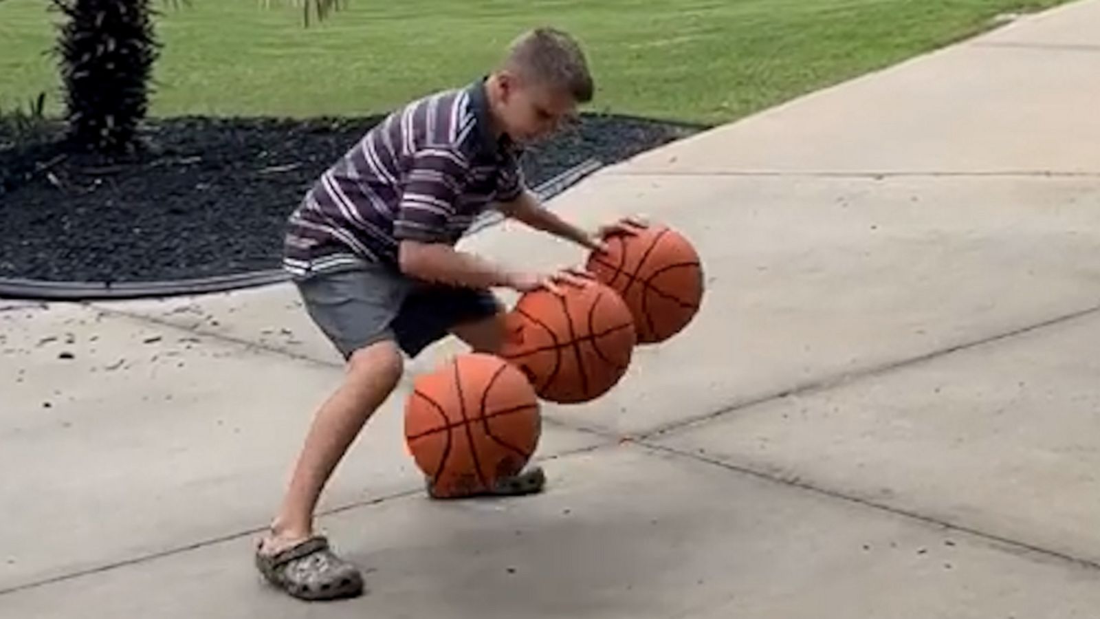 VIDEO: 9-year-old dribbles three basketballs at the same time