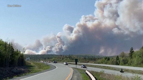 Thousands evacuated as wildfire rips through Canada