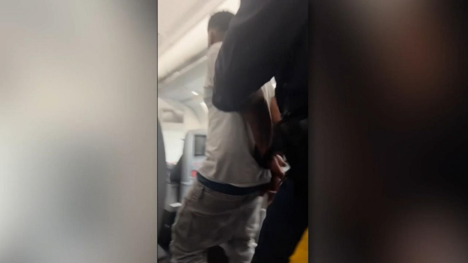 Passengers on Delta flight restrain man police say was threatening violence