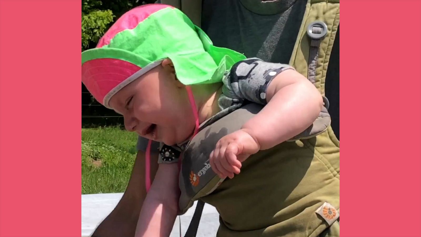 VIDEO: This baby is all laughs watching dad plant cucumbers