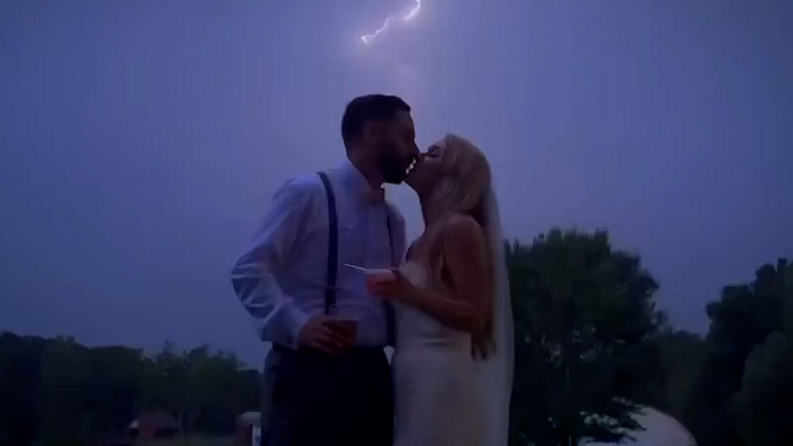VIDEO: Newlyweds ecstatic about stormy wedding photos