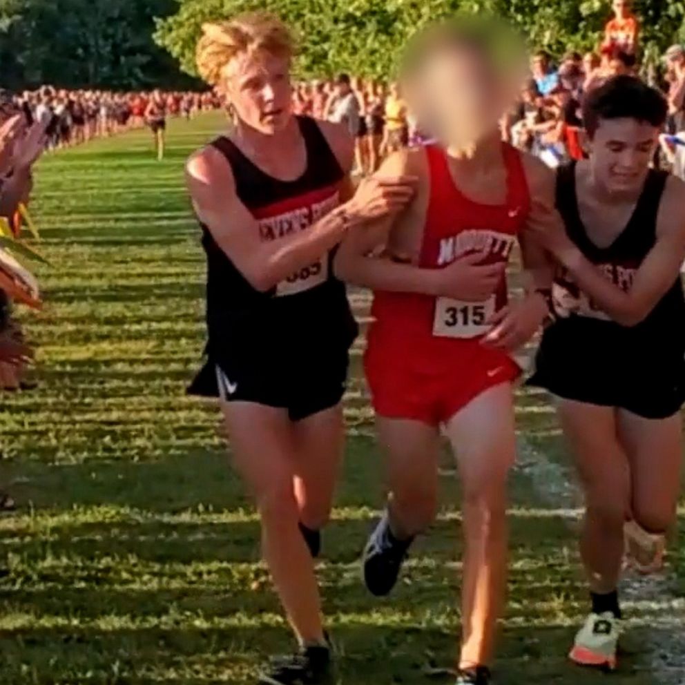 High school cross-country runners help fallen competitor cross finish line  - Good Morning America
