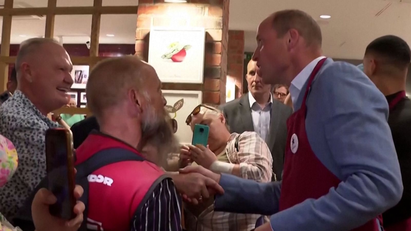 VIDEO: Prince William bumps into football legend during official visit