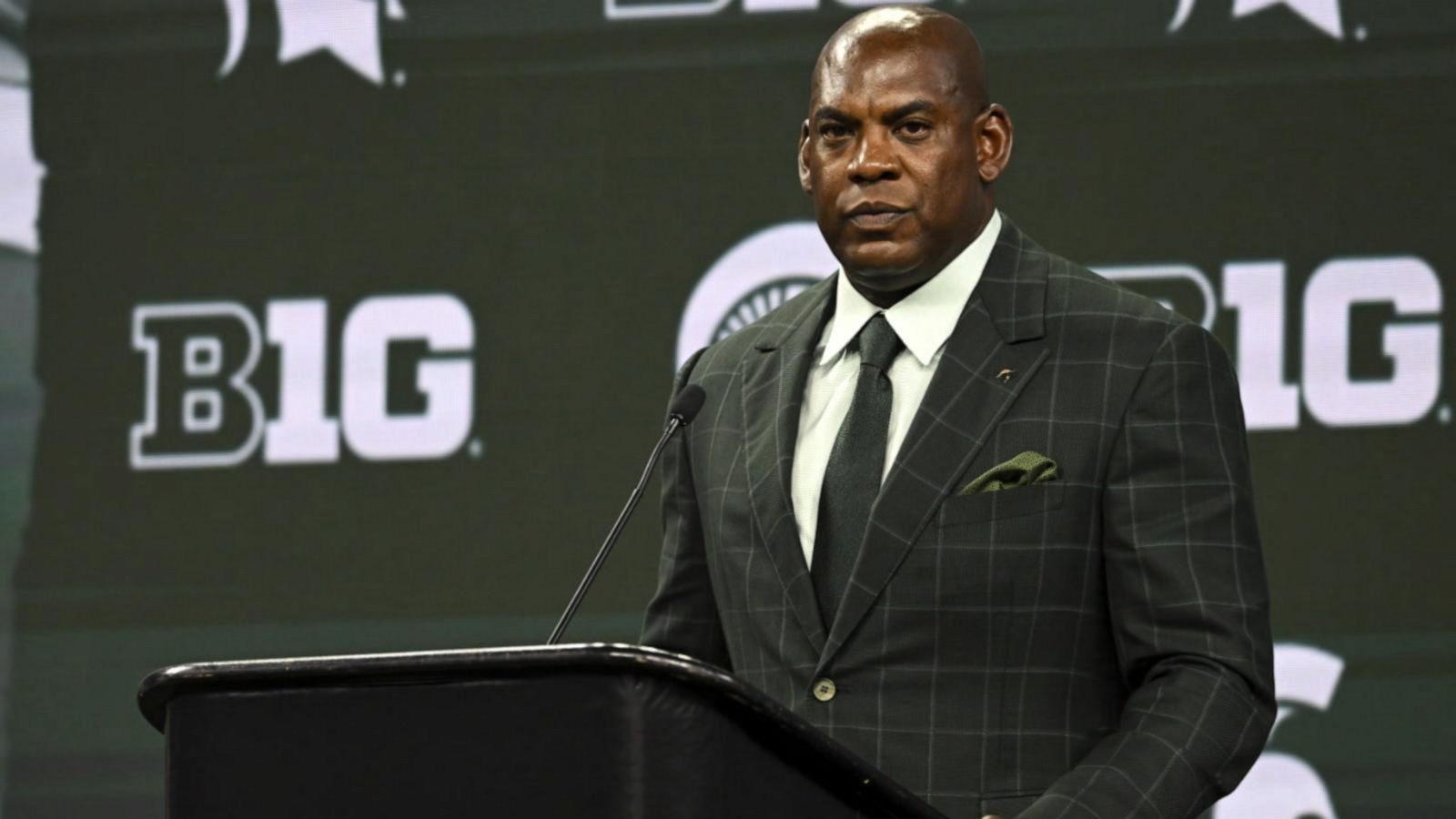 Michigan State football coach suspended amid sexual harassment ...