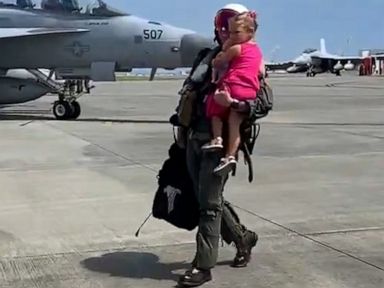 WATCH:  Girl runs to hug navy dad when he returns from deployment