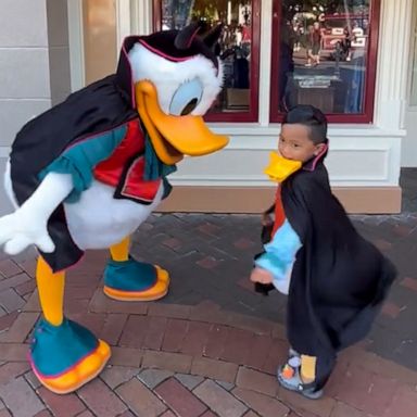 VIDEO: Donald Duck teaches young boy how to shake his tail