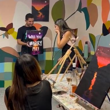 VIDEO: Surprise proposal at painting class catches woman totally off guard 