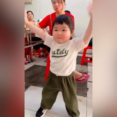 VIDEO: This girl boppin' along is the cutest thing you'll see all day