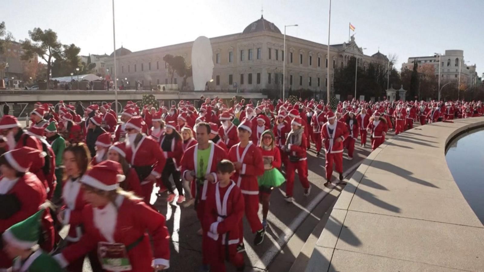 VIDEO: Santas have fun in the sun and on the run