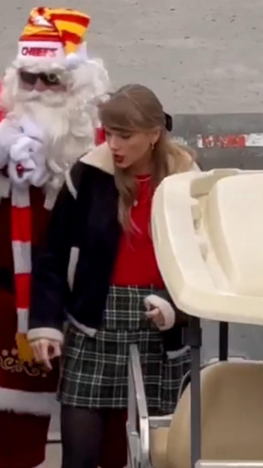 Taylor Swift rides in a golf cart with Santa at Chiefs game - Good Morning  America