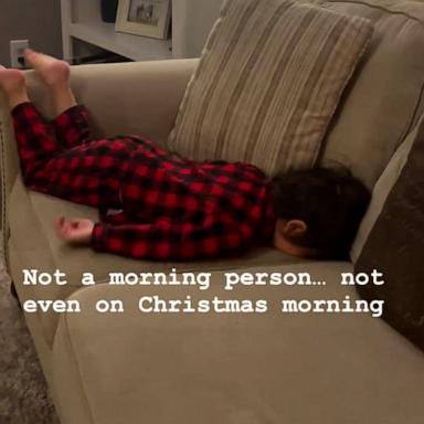 VIDEO: This little boy is not a morning person, not even on Christmas morning 