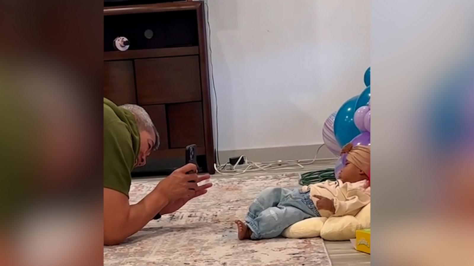 VIDEO: Grandfather gets creative when he hears how much professional baby photos cost