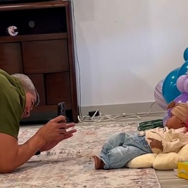 VIDEO: Grandfather gets creative when he hears how much professional baby photos cost