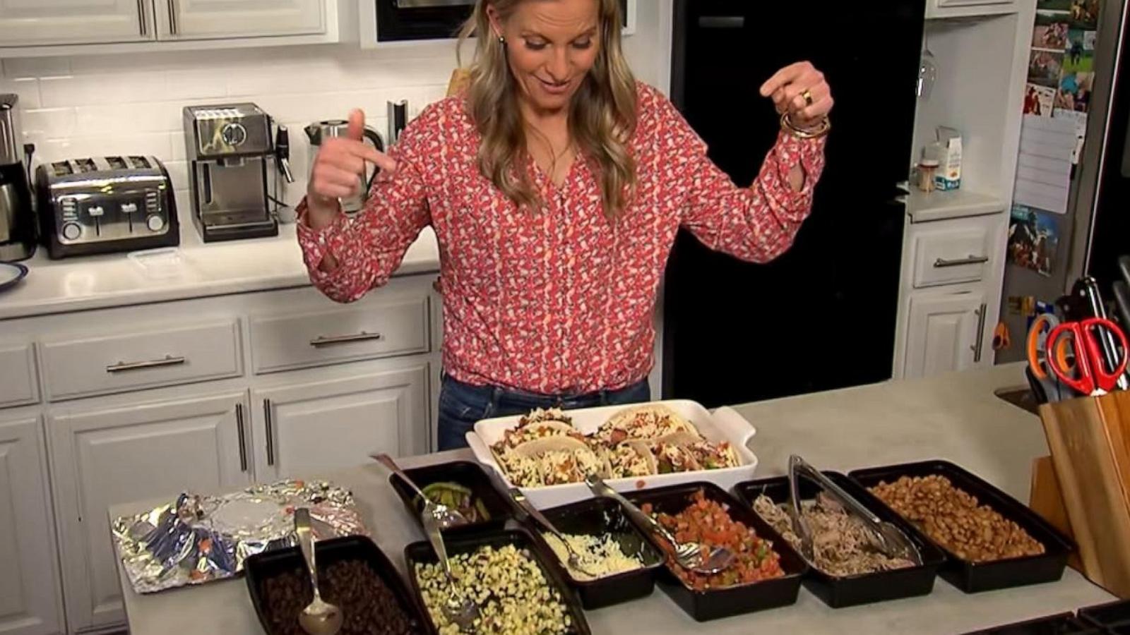 PHOTO: ABC News' Becky Worley prepares meals for the week with a Chipotle catering order.