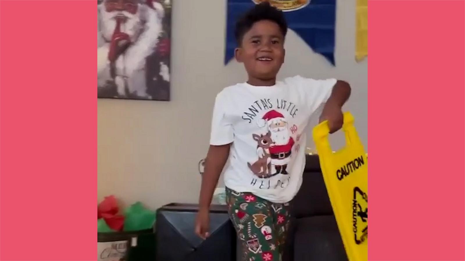 VIDEO: Boy receives ‘wet floor’ sign as Christmas gift and couldn’t be happier