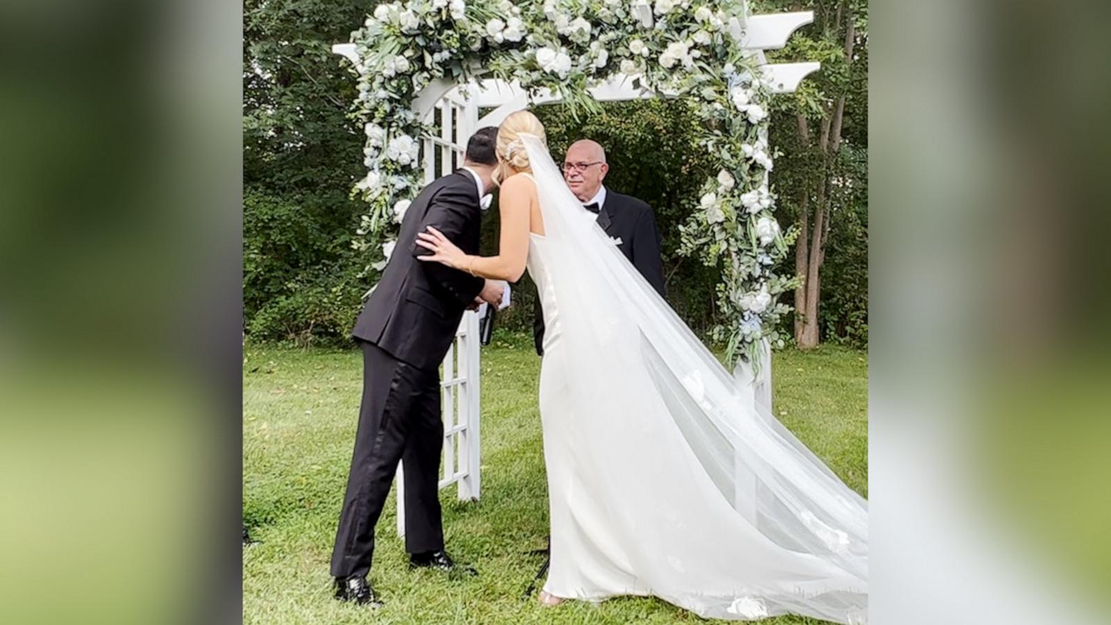 VIDEO: The story behind the couple who adopted the cat that interrupted their wedding vows