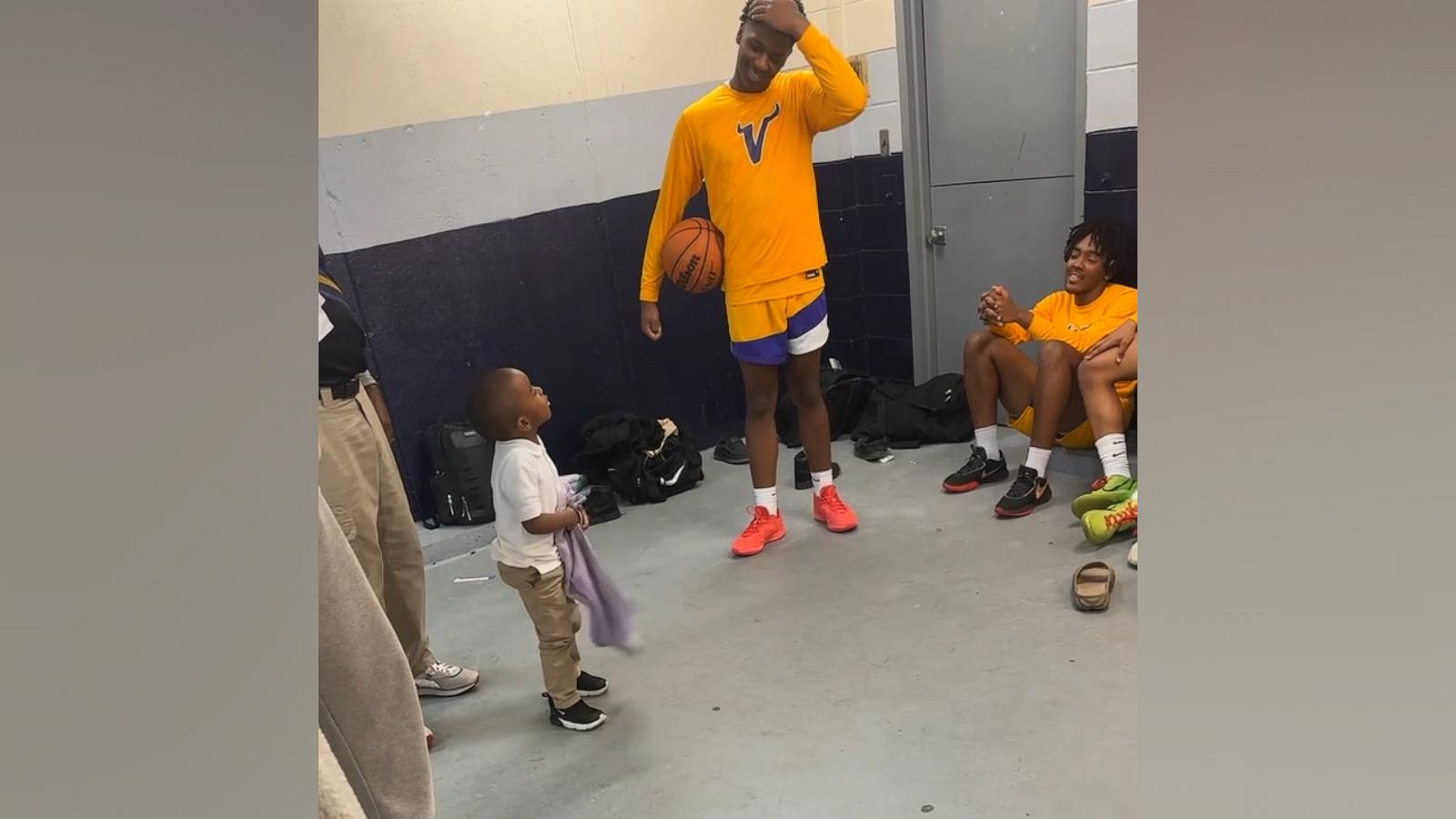 VIDEO: Watch this coach's adorable toddler shadow him courtside