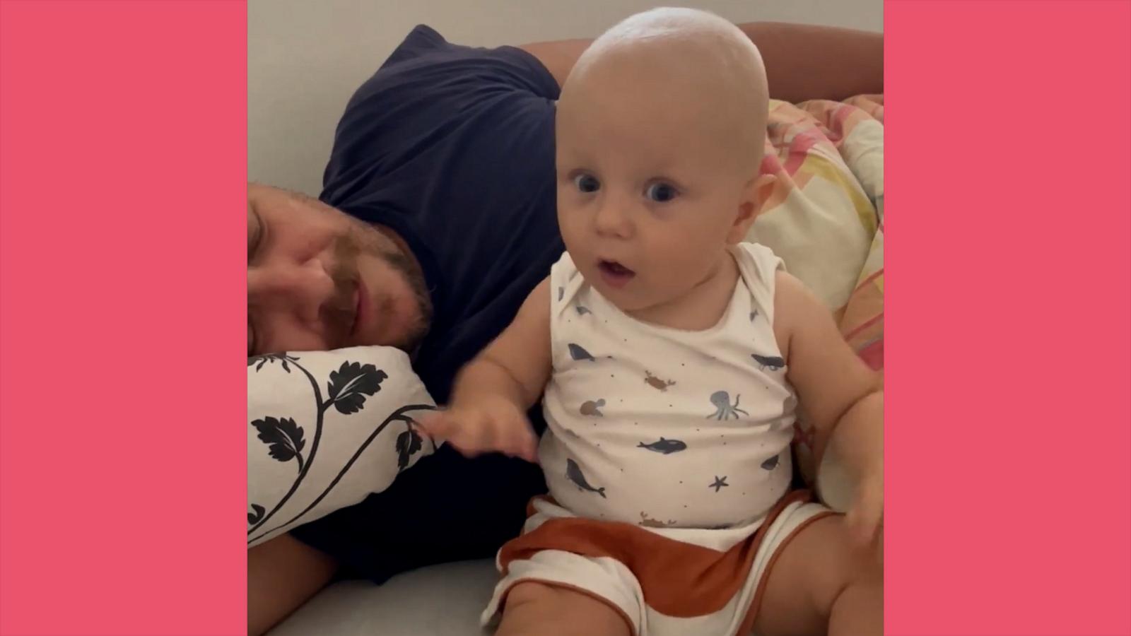 VIDEO: Baby has hilarious reaction to his dad’s loud snoring