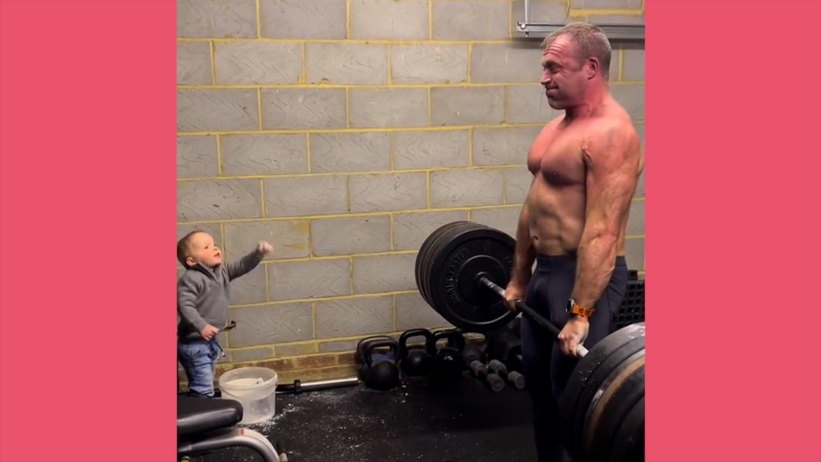 VIDEO: Adorable toddler cheers on his bodybuilder dad lifting weights