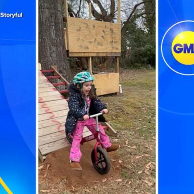 VIDEO: Brother teaches younger sister a new bike trick