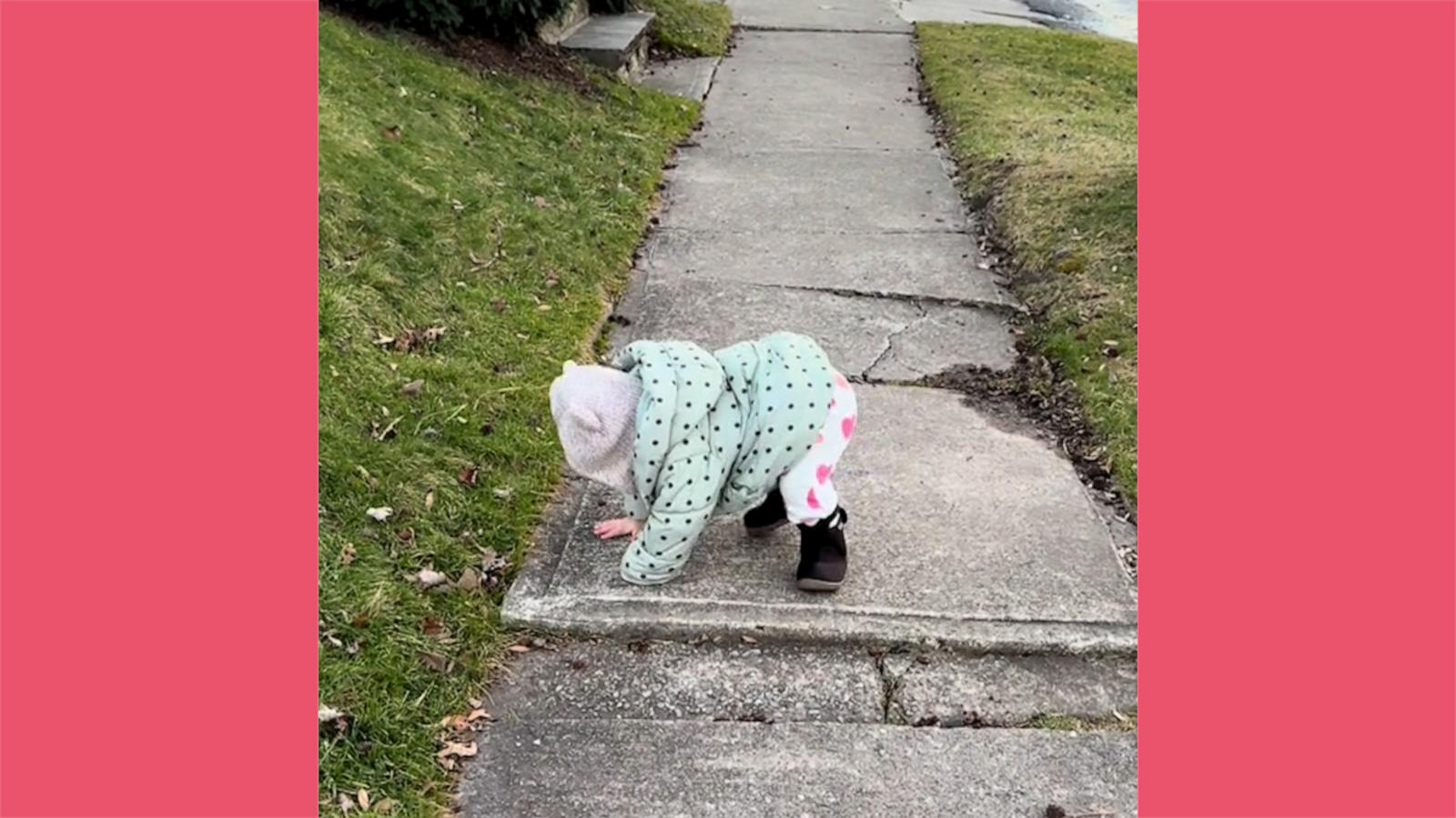 VIDEO: Toddler shows you can never be too careful avoiding sidewalk cracks