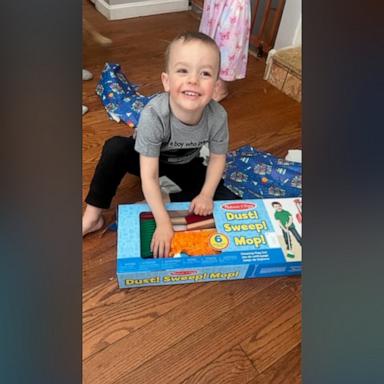 Jacob Tosetti's 4th birthday party included a robot vacuum-themed cake, cookies with vacuums on them, and even vacuum instruction manual pages posted on the walls for decoration.